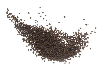 Fertilizer brown chemical accelerate growth fly fall explosion, many tiny ball fertilizer for planting float throw in mid air. White background isolated high speed freeze motion