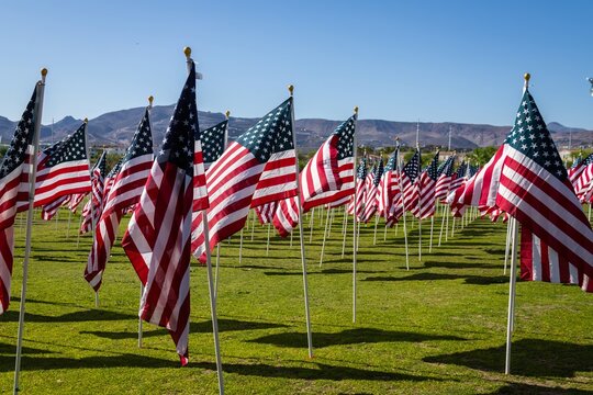 Hundreds of flags fly over a park field in Henderson, Nevada for Memorial Day