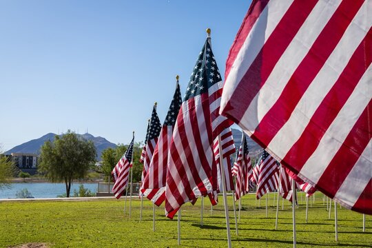 Hundreds of flags fly over a park field in Henderson, Nevada for Memorial Day