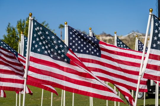 Hundreds of flags fly over a park field in Henderson, Nevada for Memorial Day