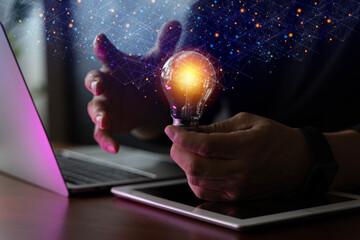 Man holding a light bulb. New ideas with technological innovation and creativity. creative concept with glowing light bulbs new creative ideas innovation