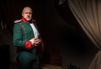 Man officer. Historical restoration. Man in military uniform. Officer of Napoleonic army. Portrait of man in historical clothes. Guy in suit for historical reenactment reenactment.