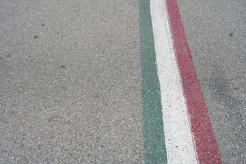 Italian flag on texture road drawn design patern