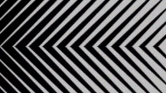 Abstract background animation with arrow line shapes moving seamlessly with noise effect. The texture of the noise grains on the lines is made hypnotic.