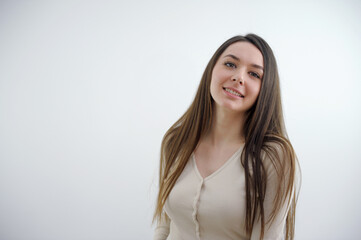 Obraz premium Young caucasian woman isolated on white background laughs out loudly keeping hand on chest. High quality photo