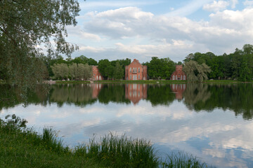 Obraz premium Architectural ensemble of the Admiralty on the shore of the Big Pond in the Catherine Park of Tsarskoye selo on a sunny summer day, Pushkin, St. Petersburg, Russia