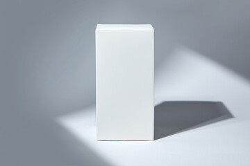 White paper box mockup in sunlight with shadow on white background.