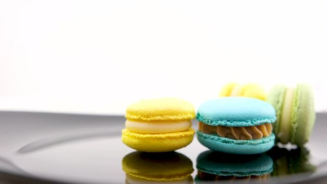 Sweet and colourful french macaroons or macaron on white background, Dessert. High quality photo
