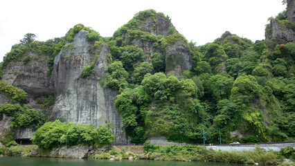 Fototapeta na wymiar 大分県耶馬渓、青の洞門と奇岩の岩山、Cliffs of Yamakei