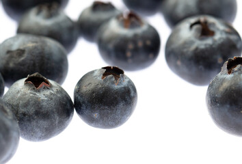 Ripe blueberries isolated on white background. Macro.