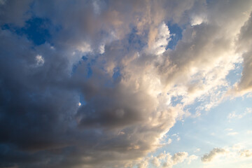 Obraz premium Thunderclouds in the sky at sunset.