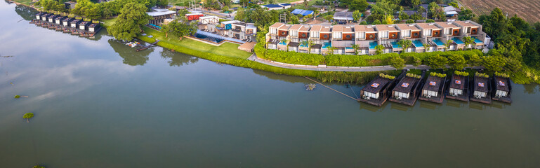 Fototapeta premium Aerial view of River Kwai and floating houses in Kanchanaburi province, Thailand
