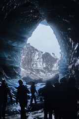Explorers Inside Katla Glacier Ice Cave, Iceland