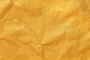 Gold paper sheet texture cardboard background.