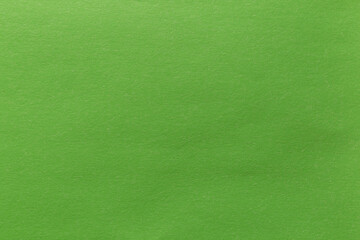 Green paper sheet texture cardboard background.