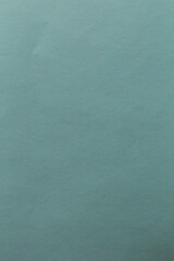 Green paper sheet texture cardboard background.