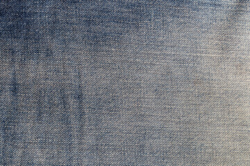 Close-up of the fabric background and denim texture.