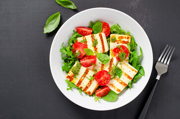 Grilled Halloumi Cheese with Cheery Tomatoes and Pesto with Arugula, Spinach, and Basil, Ketogenic Paleo Diet Lunch