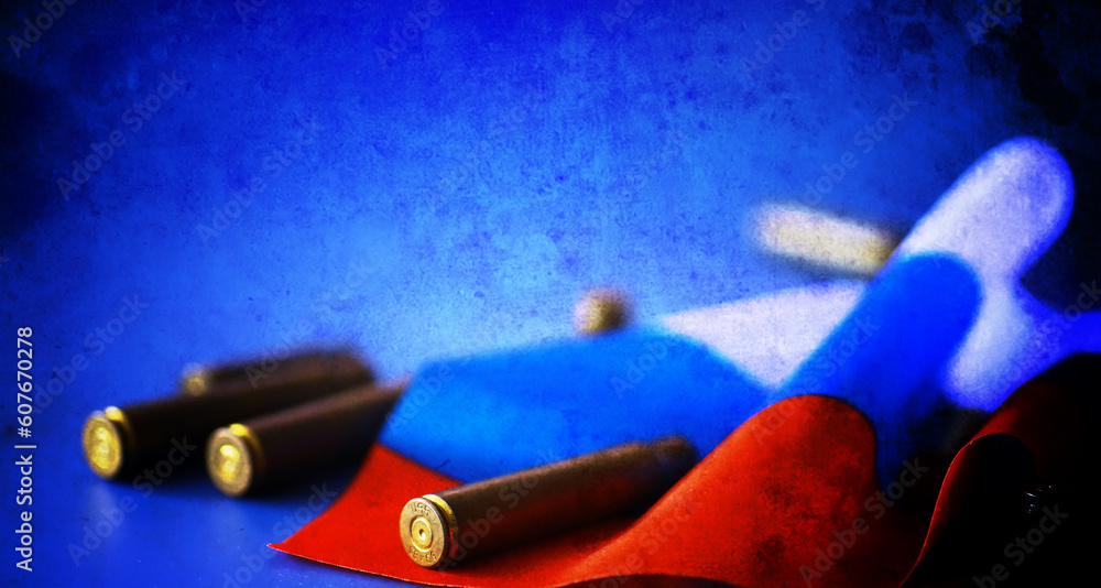 Wall mural Abstract background concept Russian army. Russian flag and bullet casings on the table.