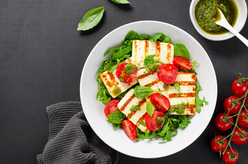Grilled Halloumi Cheese with Cheery Tomatoes and Pesto with Arugula, Spinach, and Basil, Ketogenic Paleo Diet Lunch
