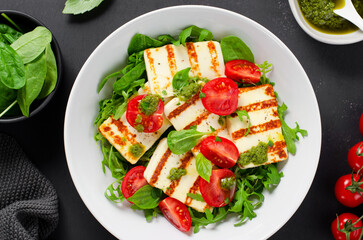 Grilled Halloumi Cheese with Cheery Tomatoes and Pesto with Arugula, Spinach, and Basil, Ketogenic Paleo Diet Lunch