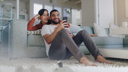 Phone, happy and couple on sofa in home for social media, online website and internet news....