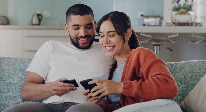 Couple, credit card and online shopping on smartphone in home for digital payment, fintech and money app. Happy man, woman and mobile banking for easy finance, website sales and password of account