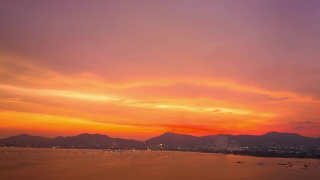 aerial hyperlapse view amazing bright red sky in colorful sky day to night..Majestic sunset or sunrise landscape Amazing light of nature background. .gradient color texture fantastic sky texture.
