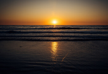 Stunning sunset over the ocean. Colorful evening sky over the sea.