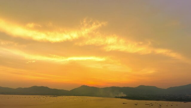 .aerial hyperlapse view amazing colorful cloud in bright sky of sunset above the ocean. .landscape amazing light of nature cloudscape bright sky above Phuket sea.. color texture sky background.