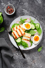 Healthy Ketogenic Paleo Meal, Grilled Halloumi with Lettuce, Radish, Cucumber, and Boiled Egg, Detox, Diet Lunch