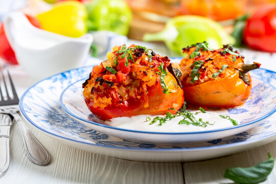 Stuffed red peppers with herbs.