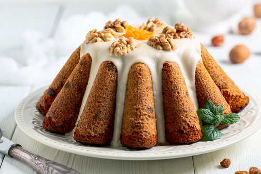 Homemade carrot cake with icing sugar.