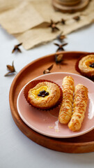 cheesy egg tart and cheese roll, crispy puff pastry with cheese stick inside.