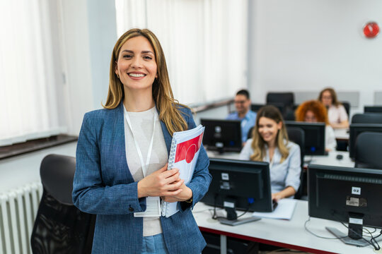 Educator and students in programming school