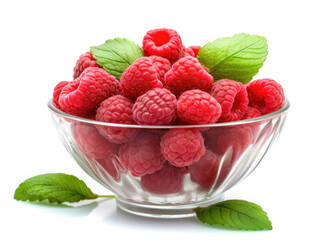 Glass bowl with raspberries and green leaves on a white background