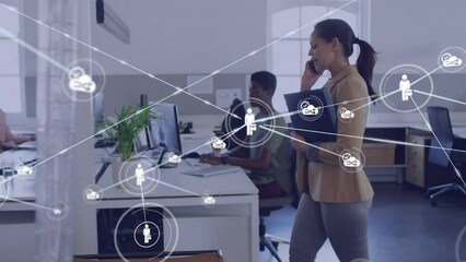Animation of data processing over diverse business people in office - Powered by Adobe