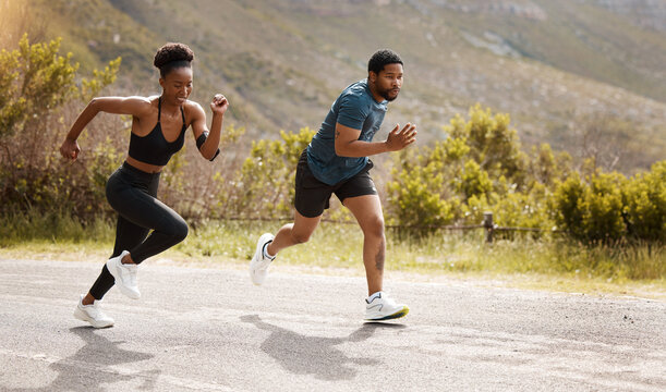Fitness, training and black couple running, outdoor and cardio with endurance health and wellness. Runners, man and woman in the street, run or progress with speed, cardio and marathon with a target