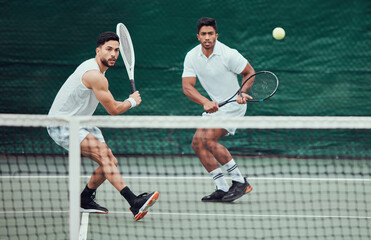 Male team, ball and tennis court during a competition in india for fitness, health and sport. Man,...