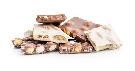 Dark and white chocolate bars with nuts isolated on white background.