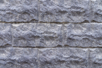 Gray stone wall as texture, pattern, background