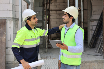 Two technician civil engineer or specialist inspector discussing, brainstorm and planing work with...