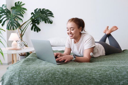 Freelancer with diabetes working on laptop at home