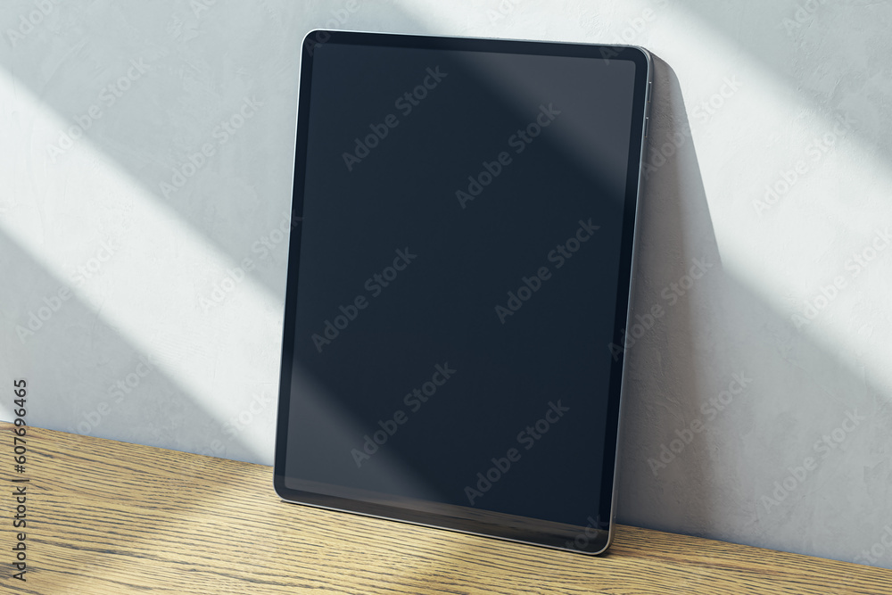 Poster perspective view on blank dark digital tablet screen with place for web site or design on wooden sur