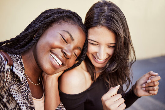 Girl friends, laugh and happiness outdoor with funny joke and smile from love and support. Comedy, women and happy young people with diversity in town laughing with street fashion and friendship