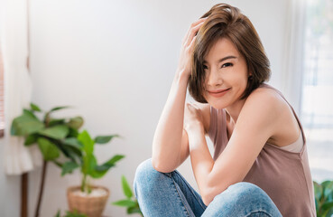 Naklejka premium Closeup portrait beauty asian woman short hair fashion with fair perfect healthy glow skin copy space, young beautiful asia gir,l pretty smile face Beauty korean asian women spa skincare banner
