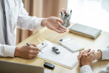 Loss Adjuster Insurance Agent Inspecting Damaged Car. .Sales manager giving advice application form...