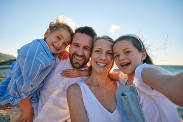 Parents, kids and beach selfie with smile, hug or care in summer sunshine on outdoor holiday....