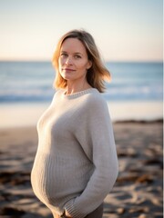 Portrait of a beautiful woman on the beach at sunset. Soft focus.