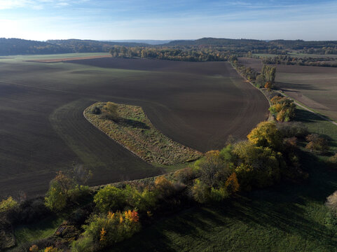 Aerial view of small scale agriculture and ploughing in Brandenburg, Germany.